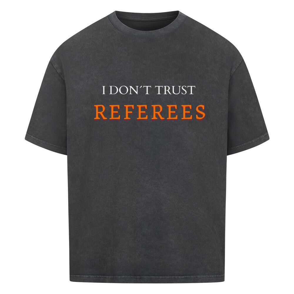 Washed Schwarzes Oversized T-Shirt mit dem minimalistischen Statement-Print „I DON'T TRUST REFEREES“, wobei das Wort „REFEREES“ in Orange hervorgehoben ist. 100% Baumwolle.