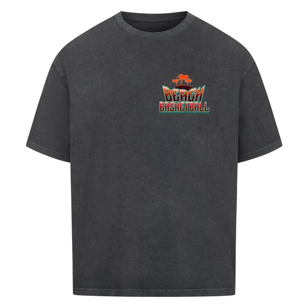 Kleiner "Beach Basketball" Retro-Print mit Palmen in Orange und Türkis auf der linken Brust eines washed schwarzen Oversized T-Shirts. 100% Baumwolle