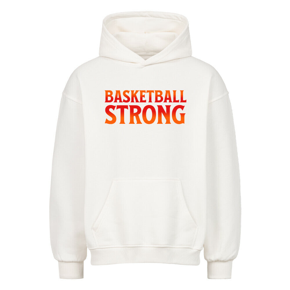 Vorderansicht eines weißen Oversized-Hoodies mit dem Aufdruck 'BASKETBALL STRONG' in einer rot-orangen Farbverlaufsschrift auf der Brust. 80% Baumwolle 20% Polyester.