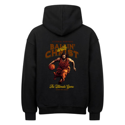 Rückansicht eines schwarzen Oversized-Hoodies mit 'Ballin' with Christ' Print, der Jesus beim Basketball-Dribbling zeigt, und dem Text 'Eternal Purpose'. 80% Baumwolle 20% Polyester.