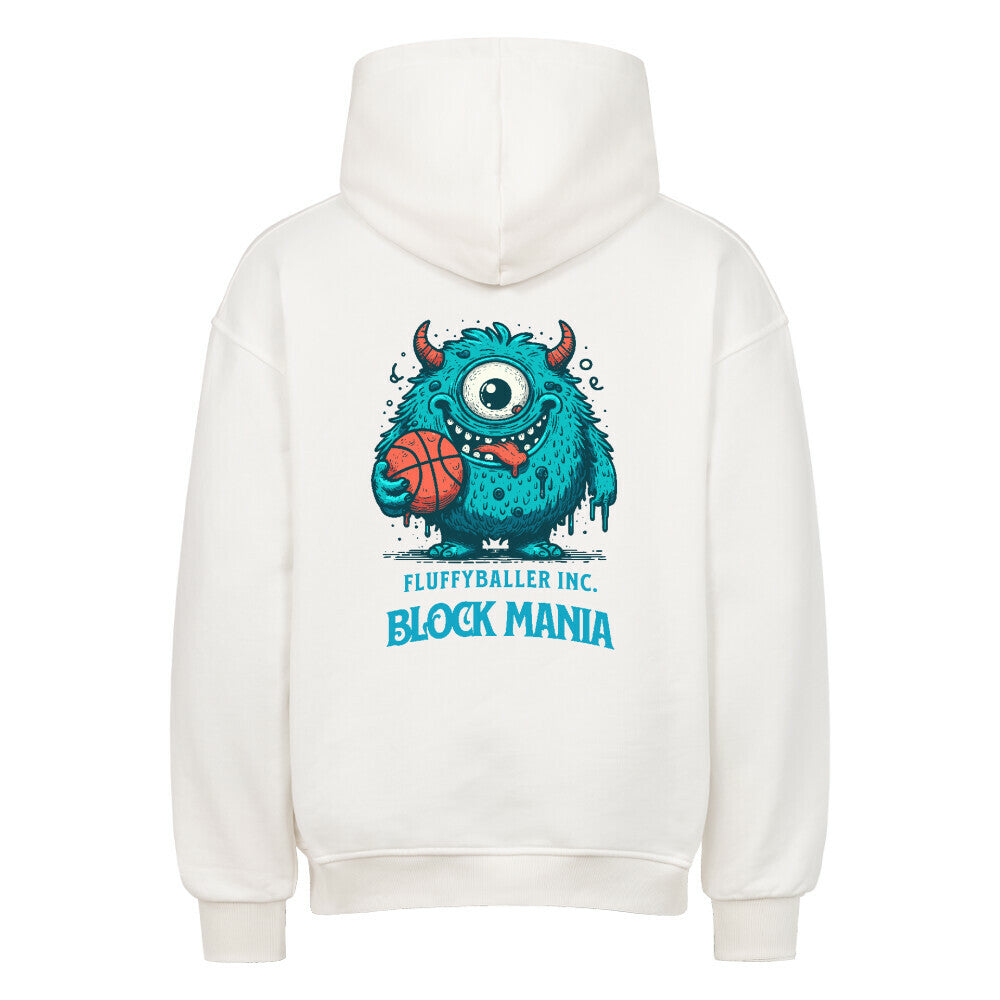 Rückansicht eines Weißen Oversized-Hoodies mit 'Block Mania' Print, der ein türkises, einäugiges Monster zeigt, das einen Basketball hält.